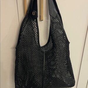 Eric Javitz mesh tote bag with leather trim.